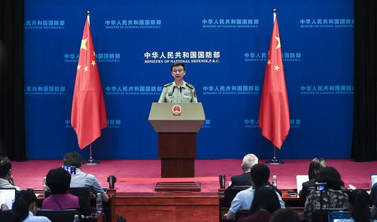 Photo shows Wu Qian, spokesperson with the Ministry of National Defense, speaks at the press conference on May 30, 2019. (Xinhua/Xia Yifang)