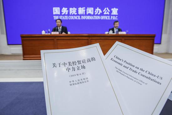 Photo taken on June 2, 2019 shows the newly-issued white paper at a press conference in Beijing, China. The State Council Information Office on Sunday issued a white paper to provide a comprehensive picture of the China-U.S. economic and trade consultations, and present China's policy position on these consultations. (Xinhua/Zhang Yuwei)
