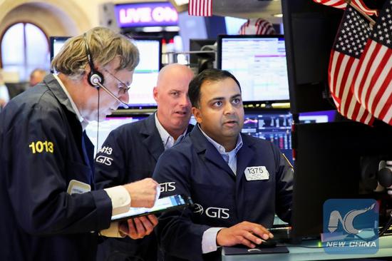 Traders work at the New York Stock Exchange in New York, the United States, on May 31, 2019. (Xinhua/Wang Ying)