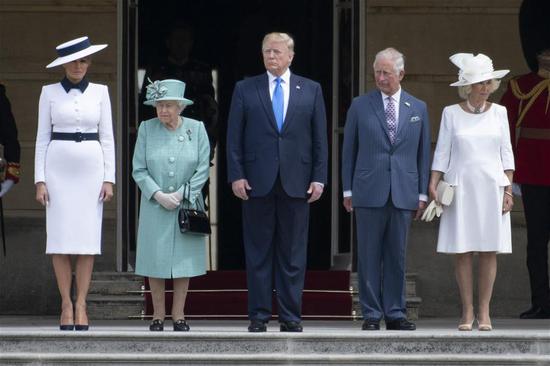 Queen Elizabeth II (2nd L), U.S. President Donald Trump (C) and his wife Melania Trump (1st L), Prince Charles (2nd R), and Camilla, attend a welcome ceremony at Buckingham Palace in London, Britain, on June 3, 2019. U.S. President Donald Trump arrived in London on Monday to start his three-day state visit to Britain as widespread protests against him are set to take place. (Xinhua/Ray Tang)