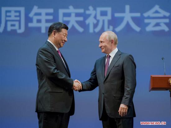 China, Russia commemorate 70th anniversary of diplomatic ties