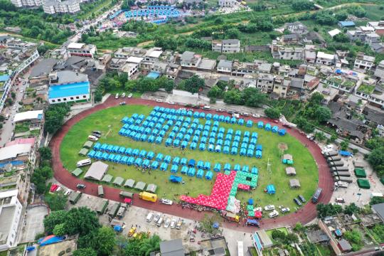 An aerial view of a temporary settlement area in Changning, Sichuan province, after a magnitude 6.0 earthquake and multiple aftershocks hit the region, June 18, 2019. (Photo by Hu Peng/chinadaily.com.cn)