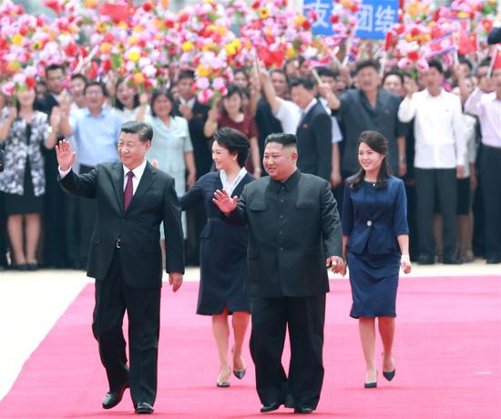 A grand welcome ceremony is held by the Democratic People's Republic of Korea (DPRK) side for General Secretary of the Central Committee of the Communist Party of China (CPC) and Chinese President Xi Jinping at the Sunan International Airport in Pyongyang, DPRK, June 20, 2019. (Xinhua/Pang Xinglei)