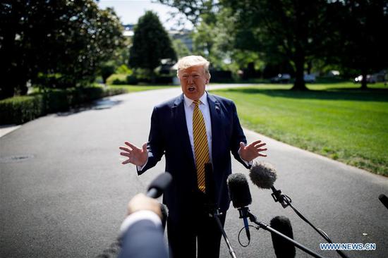U.S. President Donald Trump speaks to reporters before departing from the White House in Washington D.C., the United States, June 22, 2019. Donald Trump on Saturday said that the United States would impose major additional sanctions against Iran on Monday. (Xinhua file photo/Ting Shen)