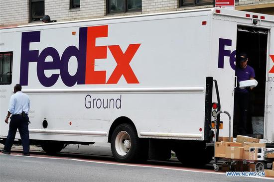 A FedEx delivery truck is pictured in Manhattan, New York, the United States, June 25, 2019. U.S. courier delivery company FedEx Corp. on Monday sued the U.S. Department of Commerce over a request that the package giant enforce restrictions on Chinese telecom equipment provider Huawei. (Xinhua/Li Muzi)