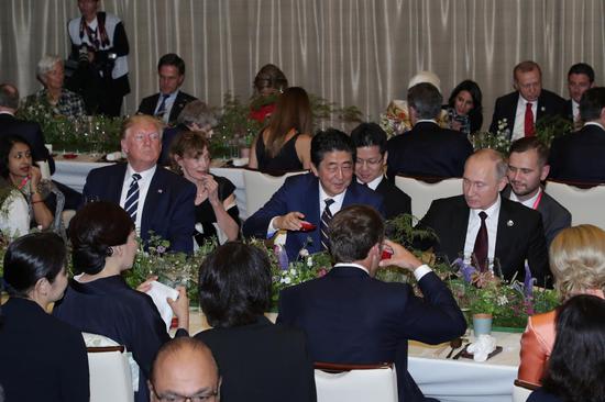 G20 countries' leaders and delegates, including Japan’s Prime Minister Shinzo Abe, U.S. President Donald Trump and Russia's President Vladimir Putin, attend the leaders' dinner at Osaka Geihinkan in Osaka, Japan, June 28, 2019.  (Photo/Agencies)