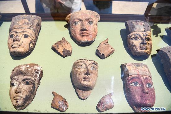 Photo taken on June 28, 2019 shows relics unearthed from a tomb dating back to the Middle Kingdom era which is some 500 meters from the pyramid of Senusret II, the Pharaoh of the 12th Dynasty, in Faiyum, Egypt. (Xinhua/Li Yan)