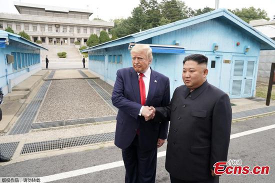 U.S. President Donald Trump meets with Kim Jong Un, top leader of the Democratic People's Republic of Korea (DPRK), in the inter-Korean border village of Panmunjom on June 30, 2019. (Photo/Agencies)