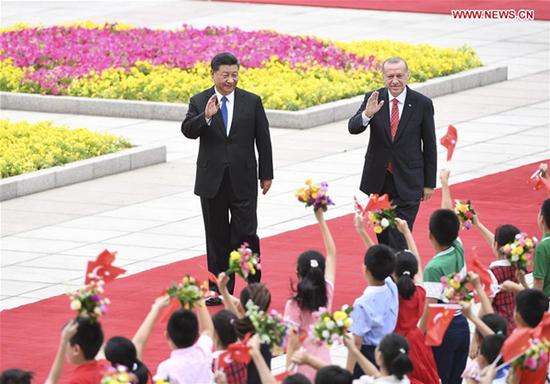 Chinese President Xi Jinping holds a welcome ceremony for Turkish President Recep Tayyip Erdogan before their talks in Beijing, capital of China, July 2, 2019. Xi held talks with Erdogan at the Great Hall of the People in Beijing on Tuesday. (Xinhua/Yin Bogu)