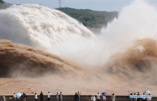 Water gushes out from Xiaolangdi Reservoir on Yellow River