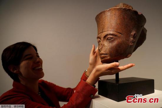Egypt condemns planned sale of Pharoah statue head