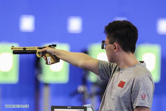 Zhang Bowen of China shoots during the 10m Air Pistol Men Final during the 30th Summer Universiade in Naples, Italy, on July 5, 2019. (Photo/Xinhua)