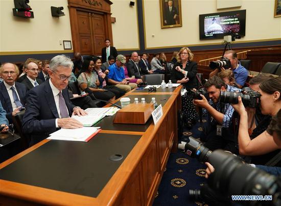 U.S. Federal Reserve Chairman Jerome Powell prepares to testify before the House Financial Services Committee on the state of the U.S. economy, on Capitol Hill in Washington D.C., the United States, on July 10, 2019. Jerome Powell said Wednesday that crosscurrents such as trade tensions and concerns about global growth have been weighing on the U.S. economic activity and outlook. (Xinhua/Liu Jie)