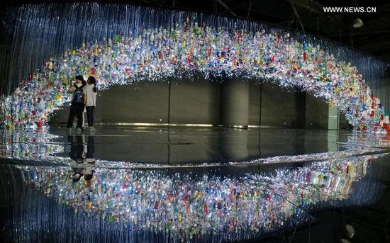 Artwork made of recycled plastic products exhibited in Shanghai