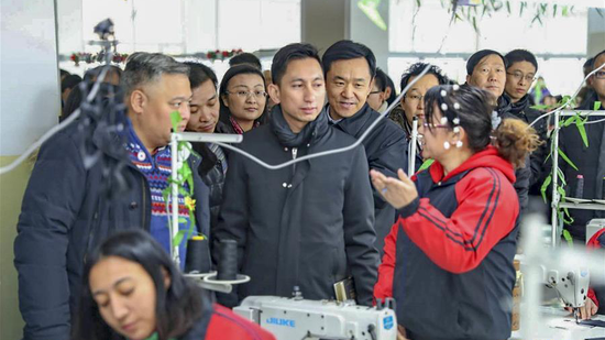 Diplomats from 12 countries visited a vocational center in Xinjiang, December 28-30, 2018. (Photo/Xinhua)