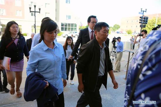 Family members of visiting Chinese scholar Zhang Yingying head to the federal courthouse building in Peoria, Illinois, the United States, on July 17, 2019. After a U.S. judge concludes all the evidence from the sentencing phase in the Chinese scholar slaying trial Tuesday, closing arguments from both prosecutors and the defense started here Wednesday morning. The closing arguments of the sentencing phase for Brendt Christensen who was found guilty of killing Zhang Yingying in 2017 took place around 9 a.m.(1400 GMT) at a federal court of Peoria, in the U.S. state of Illinois. (Xinhua/Wang Ping)