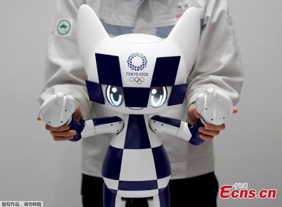 Toyota unveils robots for Tokyo Games