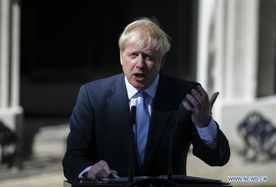 Newly elected Conservative Party leader and British Prime Minister Boris Johnson speaks at 10 Downing Street in London, Britain, July 24, 2019. (Xinhua/Han Yan)