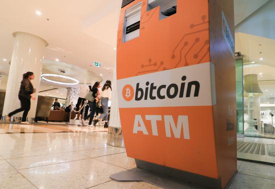 A bitcoin ATM at a shopping center in Adelaide, Australia. （Photo/China Daily)