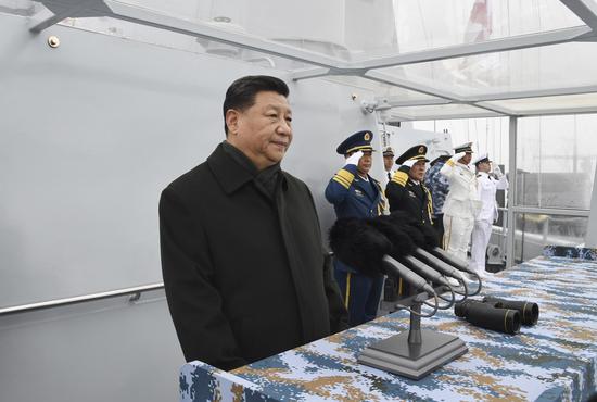 Chinese President Xi Jinping, also general secretary of the Communist Party of China Central Committee and chairman of the Central Military Commission, reviews a multinational fleet during a naval parade held in Qingdao, east China's Shandong Province, on April 23, 2019. (Xinhua/Li Gang)