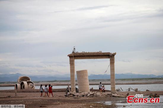 Drought reveals lost temple in Thailand submerged by dam