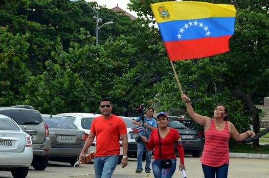 People take part in the March in Solidarity with Venezuela in Havana, Cuba, on Aug. 25, 2017. (Xinhua/Joaquin Hernandez)