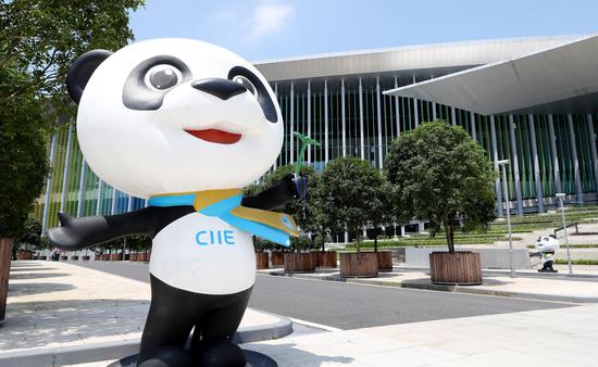 Jinbao, mascot of China International Import Expo (CIIE), stands at the National Exhibition and Convention Center (Shanghai), the main venue of the first CIIE, in Shanghai, east China, July 26, 2019. (Xinhua/Fang Zhe)