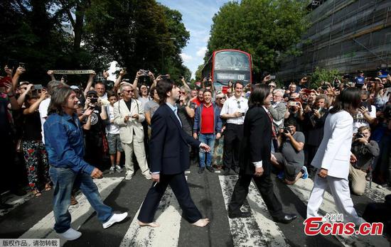 Beatles fans come together for 50th anniversary of Abbey Road photo