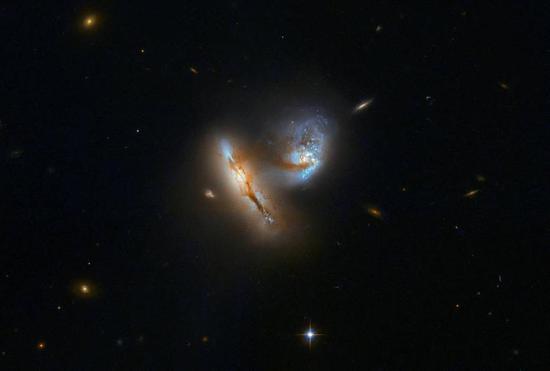 Hubble watches graceful dance of interacting galaxies: UGC 2369