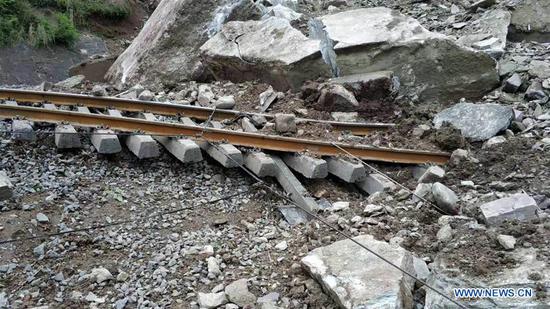 People missing after rock collapse in SW China