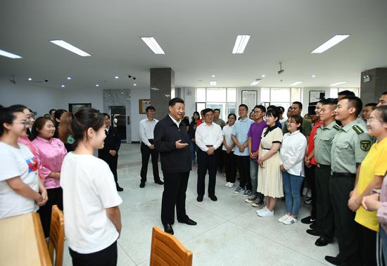 Chinese President Xi Jinping, also general secretary of the Communist Party of China (CPC) Central Committee and chairman of the Central Military Commission, visits Inner Mongolia University in Hohhot, north China's Inner Mongolia Autonomous Region, July 16, 2019. (Xinhua/Xie Huanchi)