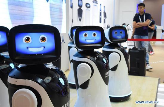  Photo taken on Aug. 20, 2019 shows robotic receptionists during the 2019 World Robot Conference in Daxing District of Beijing. (Xinhua/Ren Chao)