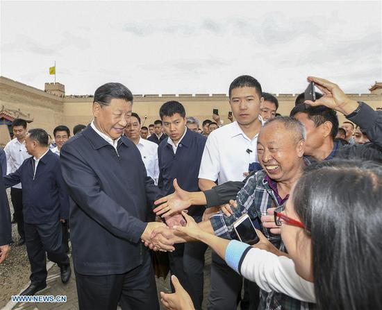 Chinese President Xi Jinping, also general secretary of the Communist Party of China Central Committee and chairman of the Central Military Commission, visits the Jiayu Pass, a famed part of the Great Wall in Jiayuguan City, during his inspection tour of northwest China's Gansu Province, Aug. 20, 2019. Xi also listened to an introduction to the historical and cultural background of the Great Wall and the passes in the Hexi Corridor, part of the ancient Silk Road in northwest China. (Xinhua/Xie Huanchi)