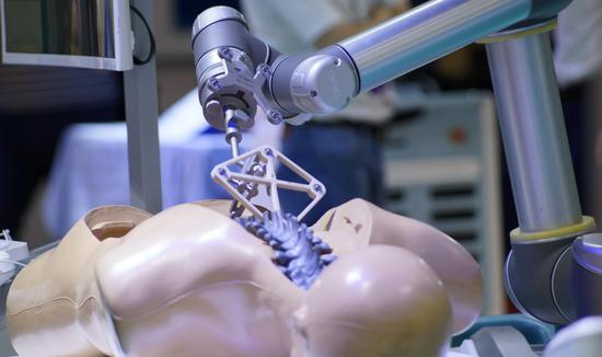 Photo taken on Aug. 21, 2019 shows a surgical operation robot exhibited at the World Robot Conference in Beijing, capital of China. (Xinhua/Li Xin)