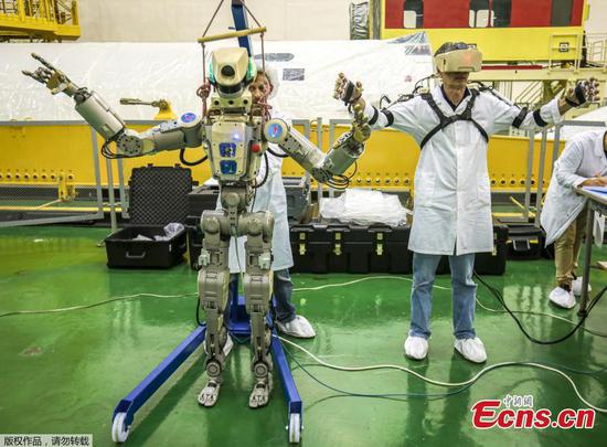 This handout picture taken on July 26, 2019 and released by the official website of the Russian State Space Corporation ROSCOSMOS on August 21, 2019 shows Russian humanoid robot Skybot F-850 (Fedor) being tested ahead of its flight on board Soyuz MS-14 spacecraft at the Baikonur Cosmodrome in Kazakhstan.  (Photo/Agencies)