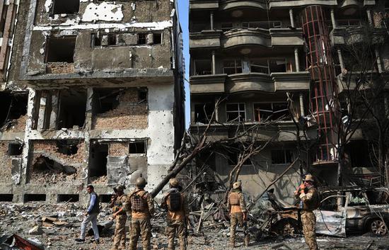 Afghan security force members inspect at the site of an attack in Kabul, capital of Afghanistan, July 29, 2019. (Xinhua/Rahmatullah Alizadah)