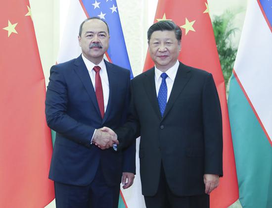 Chinese President Xi Jinping meets with visiting Uzbek Prime Minister Abdulla Aripov at the Great Hall of the People in Beijing, capital of China, Aug. 28, 2019. (Xinhua/Yao Dawei)