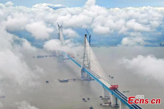 Massive road-rail bride under construction over Yangtze River