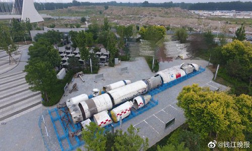 A restaurant made for the recovered fuselage of a Long March 2 rocket is under construction and will soon open in East China. (Screenshot photo/Qianjiang Evening Daily)