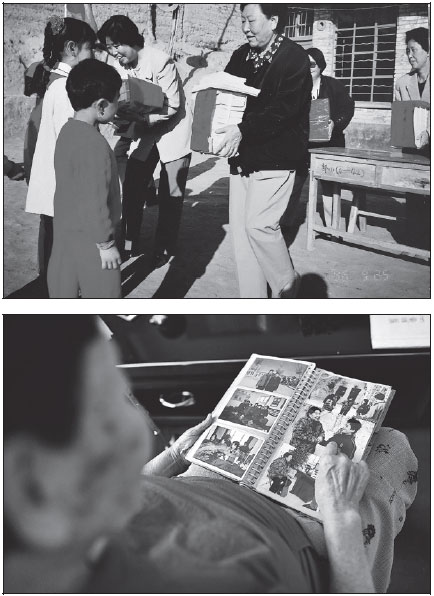 From top: Jiang brings donated books to students in a primary school in Ningxia. Jiang looks at a photo album with pictures from when she was involved in the Spring Buds project that helps girls return to classrooms. Photos by Li Jing and provided to China Daily
