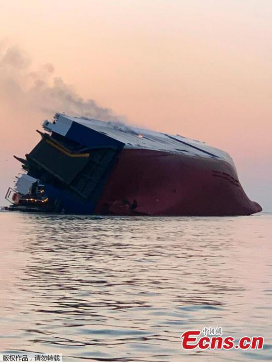 4 missing from overturned cargo ship near Georgia