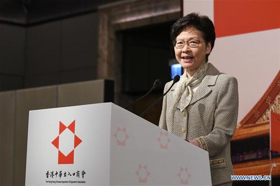 Chief Executive of China's Hong Kong Special Administrative Region (HKSAR) Carrie Lam delivers a speech at a reception held by the Hong Kong Chinese Importers' and Exporters' Association to mark the 70th anniversary of the founding of the People's Republic of China in south China's Hong Kong, Sept. 16, 2019. Carrie Lam said on Monday Hong Kong will certainly overcome the current difficulties after the HKSAR government reaches out to start sincere dialogues with the communities, with the understanding of the society and the support of the central government. (Xinhua)
