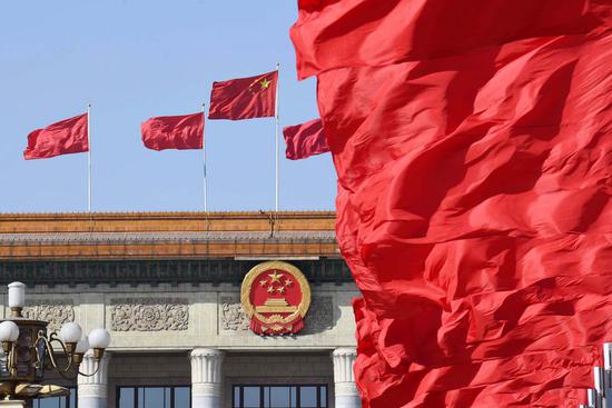 Flags at the Tian'anmen Square and atop the Great Hall of the People in Beijing, March 5, 2019. (Xinhua/Yang Zongyou)