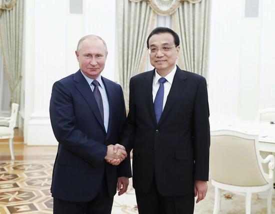 Chinese Premier Li Keqiang meets with Russian President Vladimir Putin at the Kremlin in Moscow, Russia, Sept. 18, 2019. (Xinhua/Liu Bin)