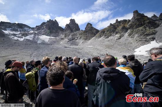 Activists stage funeral for Swiss glacier in Alps