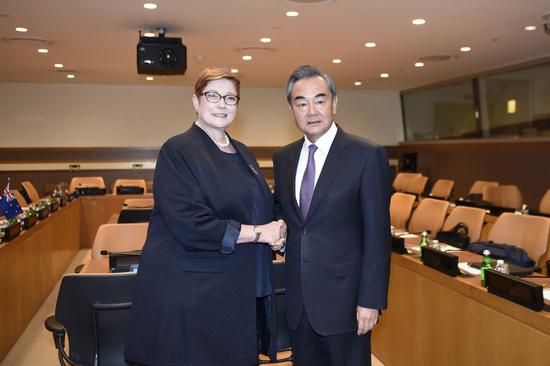 Chinese State Councilor and Foreign Minister Wang Yi (R) meets with Australian Foreign Minister Marise Payne on the sidelines of the 74th session of the United Nations General Assembly at the UN headquarters in New York, on Sept. 24, 2019. (Xinhua/Han Fang)