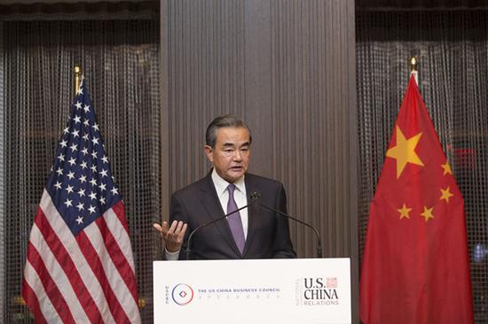 Chinese State Councilor and Foreign Minister Wang Yi delivers a keynote speech at a dinner co-hosted by the National Committee on U.S.-China Relations, the U.S.-China Business Council, the U.S. Chamber of Commerce, and Council on Foreign Relations in New York, the United States, Sept. 24, 2019. (China News Service/Liao Pan)