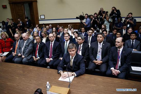 U.S. Acting Director of National Intelligence Joseph Maguire (front) testifies before the House Intelligence Committee during a hearing titled 
