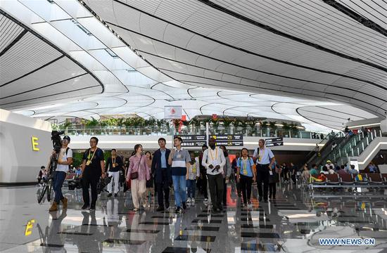 Journalists from home and abroad visit Beijing Daxing International Airport