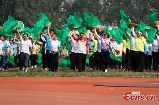 Students, teachers and farmers train for PRC’s 70th anniversary celebrations